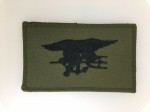 U.S. Navy SEAL qualification wings. Black on olive drab