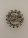 Volkswagen lapel  badge of the V.W. works at Fallersleben  in silver.