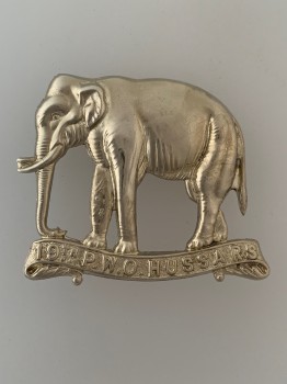 19th P.W.O. Hussars metal cap badge.