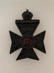 Kings Royal Rifle Corps metal cap badge.