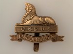 Lincolnshire Regiment metal cap badge. Brass WW1 Economy issue ANTIQUED .