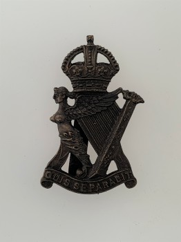 Royal Irish Rifles metal cap badge.  BLACK