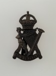 Royal Irish Rifles metal cap badge.  BLACK