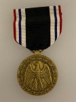 U.S.  P.O.W. medal with ribbon bar in Issue Box.